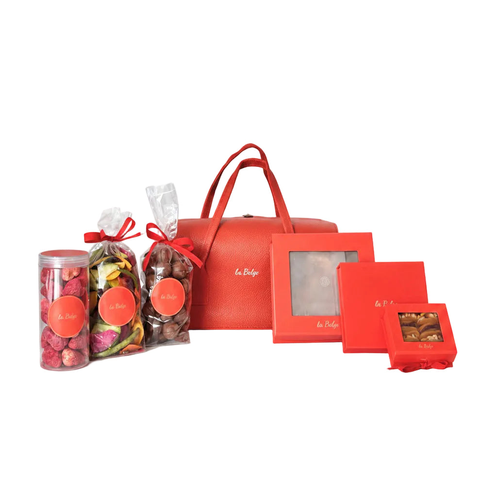 La Belge leather bag gift set with chocolate domes, dried fruits, vegetables, macadamia, and stuffed dates