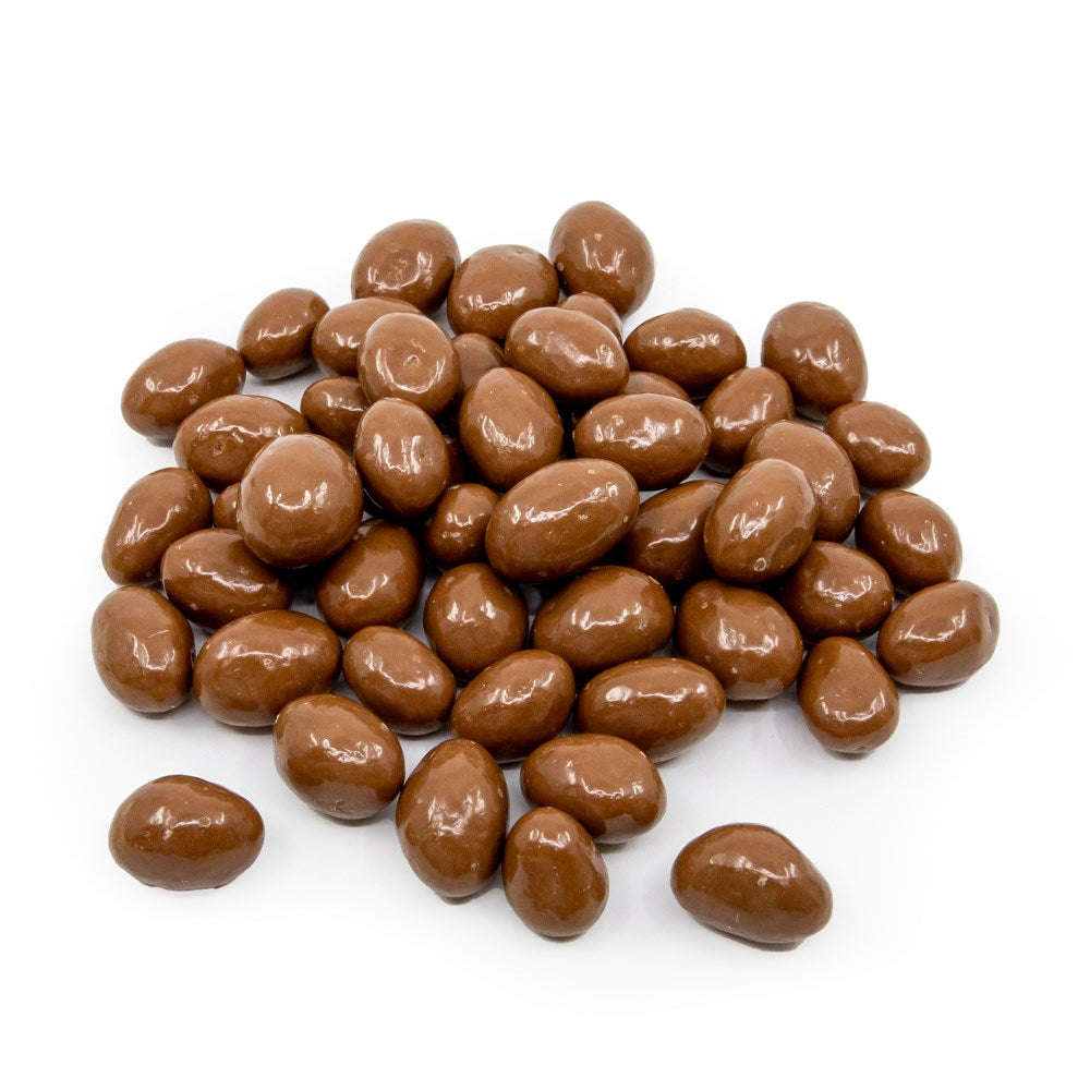 Premium whole pistachios coated in smooth Belgian milk chocolate by La Belge.